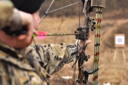 Archer aiming with bow